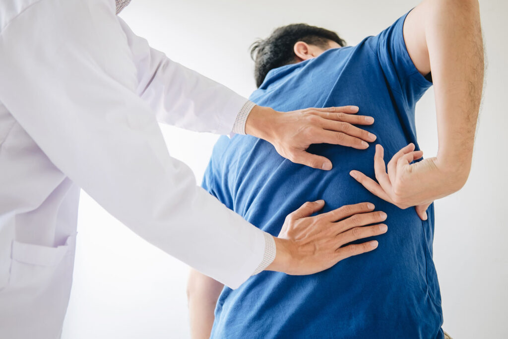 physician checking patient pain